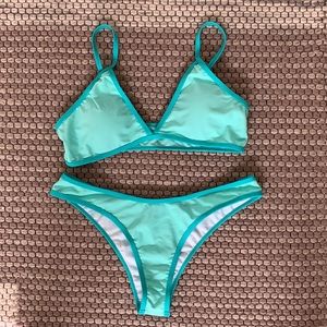 turquoise bikini that looks like oneone